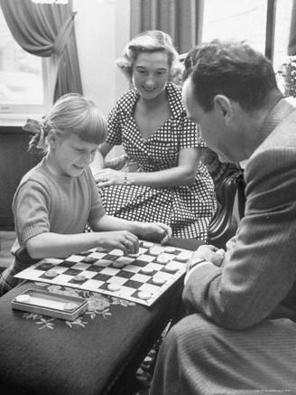Dr. Kenneth Moyer Of the Carnegie Inst. of Technology Playing Checkers with an 8 Year Old Girl